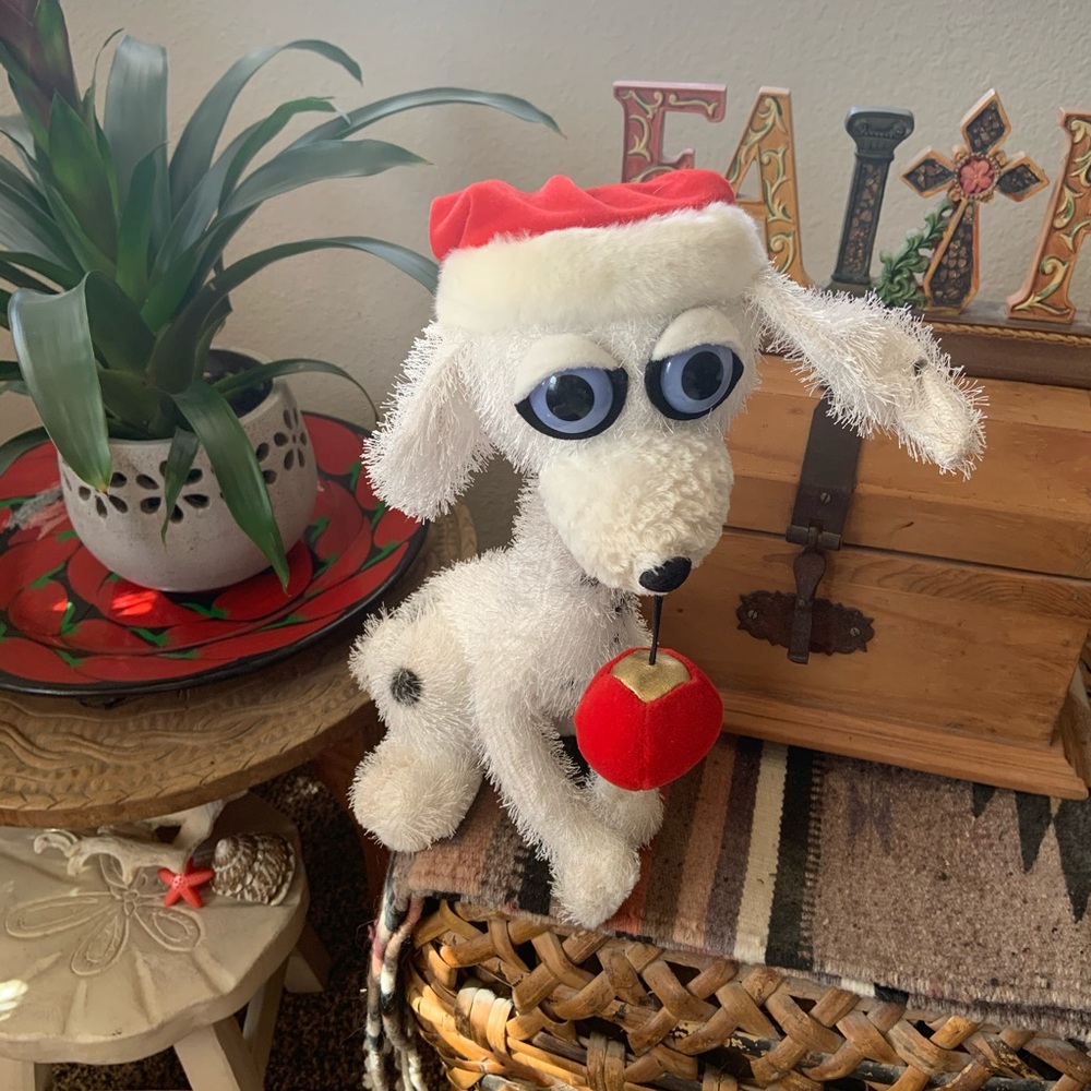Big eyes Christmas dog.